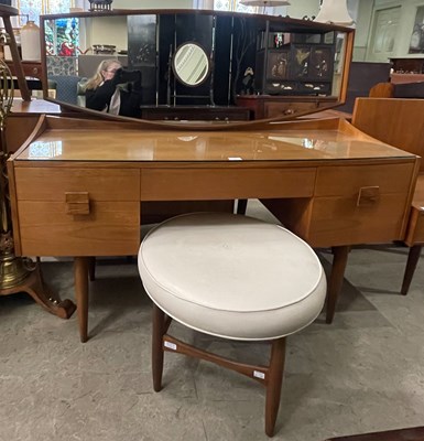 Lot 782 - A vintage G-Plan mirror back dressing table,...