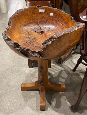 Lot 787 - A burr elm jardiniere stand by William...