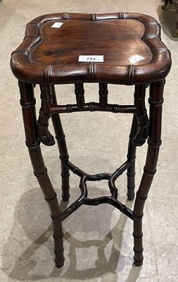 Lot 794 - A Chinese darkwood square shaped occasional...