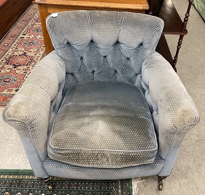 Lot 802 - A blue button down upholstered armchair on...
