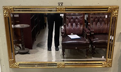 Lot 807 - A gilt framed rectangular wall mirror, 127cm...