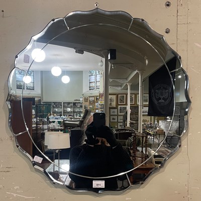 Lot 811 - An early 20th century circular wall mirror in...