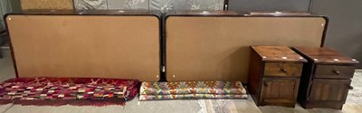 Lot 839 - A pair of stained pine single bed bases, each...