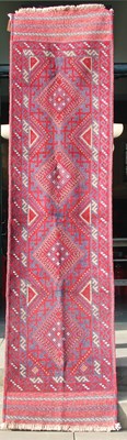 Lot 851 - A Meshwani runner, the blue ground centred...