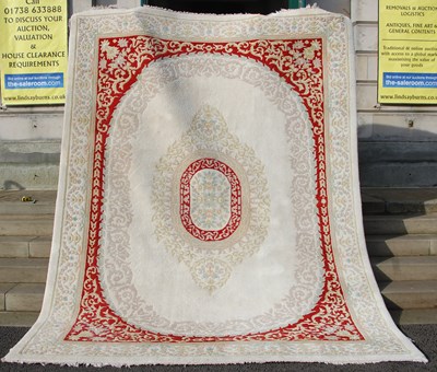 Lot 856 - A Royal Jaipur ivory ground Indian rug, with...