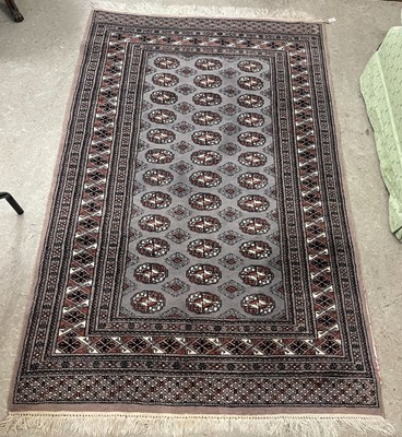 Lot 858 - A 20th century Bokhara type rug, the grey...