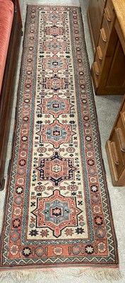 Lot 860 - An early 20th century Persian runner, the...