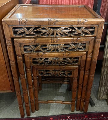 Lot 773 - A nest of four Chinese darkwood rectangular...