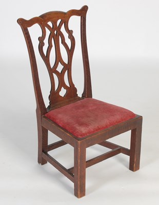 Lot 43 - A Scottish oak ‘gossip’ chair, by William...