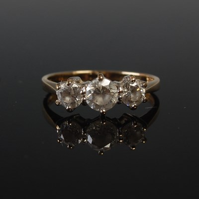 Lot 678 - A 15ct gold and cubic zirconia three stone...