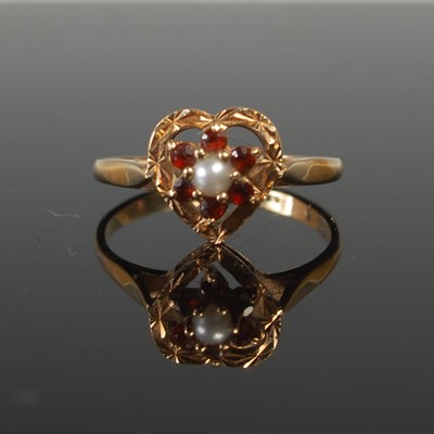 Lot 97 - A 9ct gold, garnet and pearl set heart shaped...