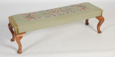 Lot 20 - An early 20th century green ground needlework...