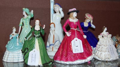 Lot 1 - A group of seven assorted ceramic lady figures...