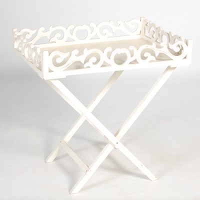 Lot 88 - A white painted tray on X-frame stand, the...