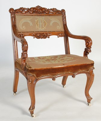 Lot 51 - A Victorian walnut armchair, with needlework...