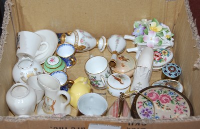 Lot 17 - A box of assorted miniature ornamental vases,...