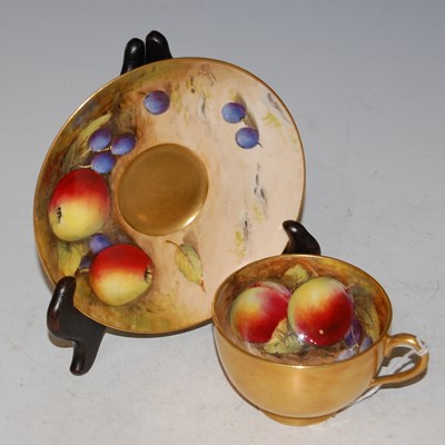 Lot 26 - A Royal Worcester teacup and saucer decorated...
