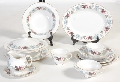 Lot 371 - A Royal Doulton Camelot pattern dinner set.