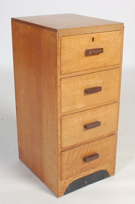 Lot 54 - An early 20th century oak chest, of four short...