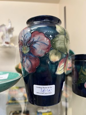 Lot 36 - A blue/ green ground Moorcroft pottery vase...