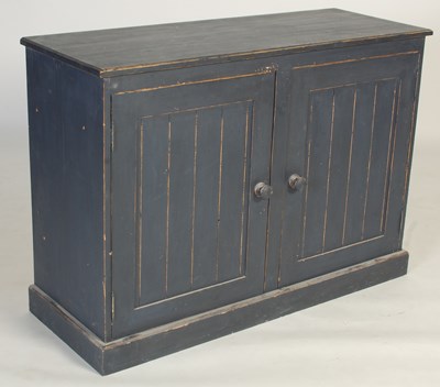 Lot 64 - A blue painted pine side cabinet, the...