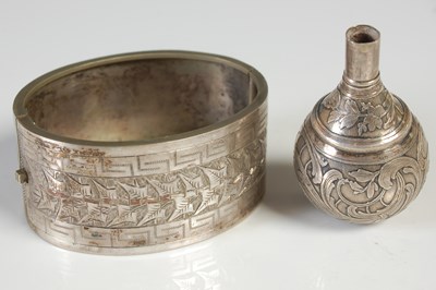Lot 188 - A white metal ball shaped finial, chased with...
