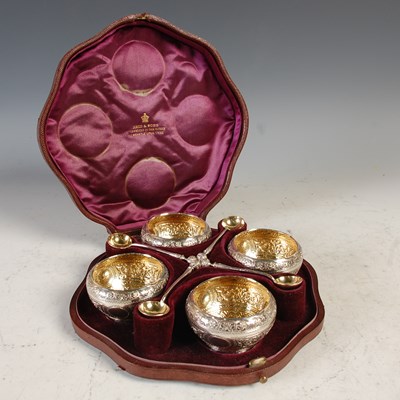 Lot 325 - A Victorian cased set of four silver gilt salt...