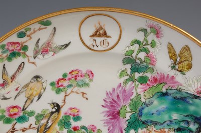 Lot 380 - A Chinese porcelain Famille Rose plate, Qing...