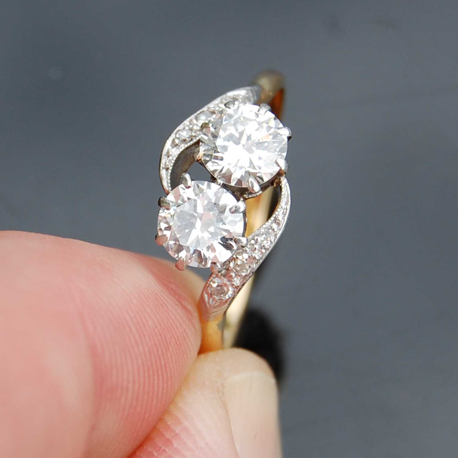 Lot 42 - A mid-20th century yellow and white metal two...