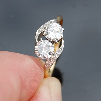 Lot 42 - A mid-20th century yellow and white metal two...