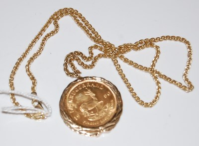 Lot 45 - A 1980 half-Krugerrand in 9ct gold mount...