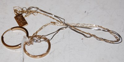 Lot 63 - A yellow metal necklace suspending a...