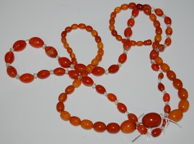 Lot 64 - A vintage amber butterscotch graduated bead...