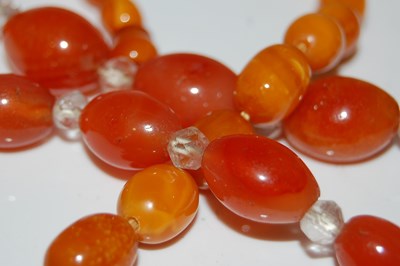 Lot 64 - A vintage amber butterscotch graduated bead...