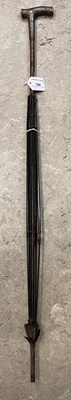 Lot 749 - A silver handled parasol (lacking canopy).