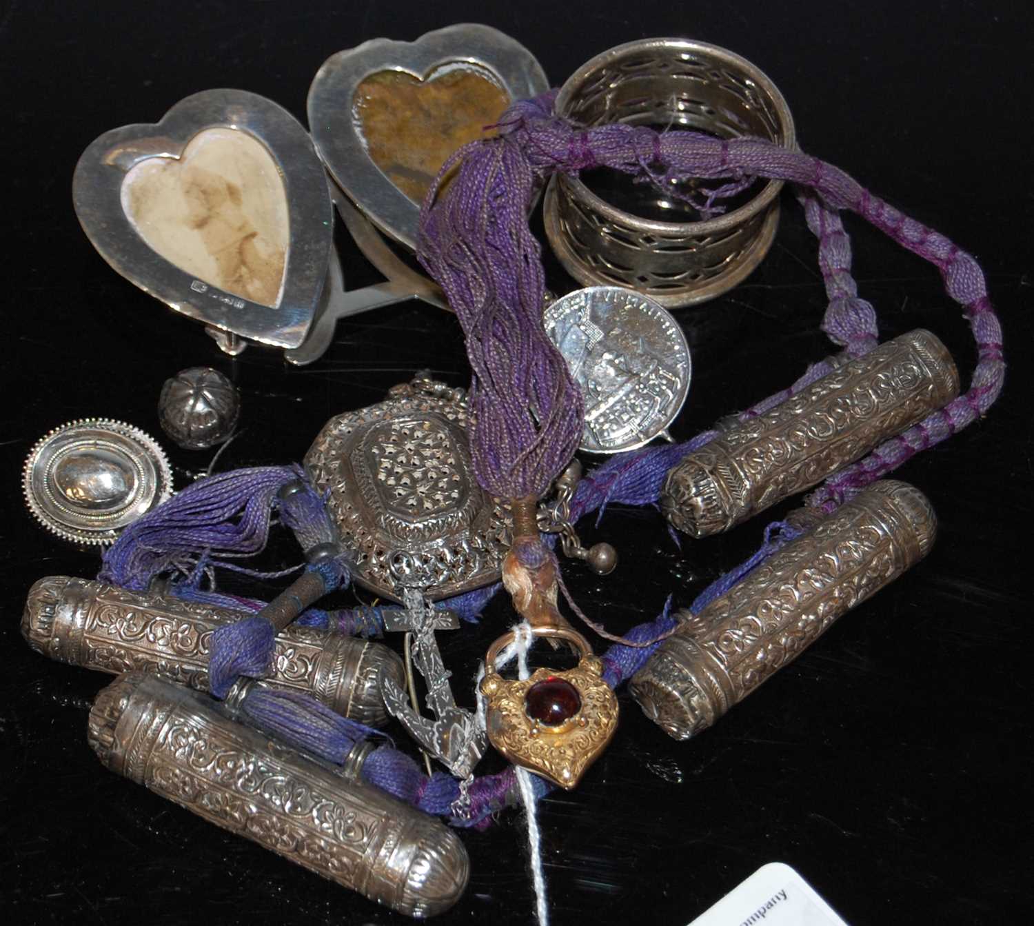 Lot 66 - An Indian / Tibetan white metal and purple,...