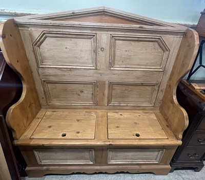 Lot 844 - A pine settle, the rectangular seat with two...