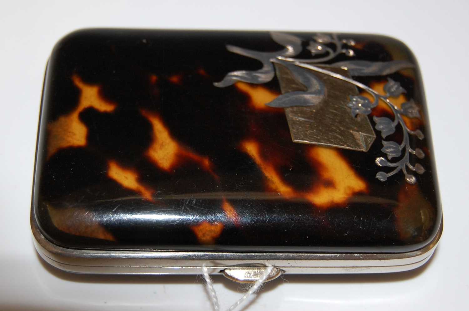 Lot 69 - A white metal mounted faux tortoiseshell purse...