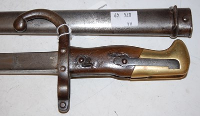 Lot 81 - A late 19th century French Bayonet, inscribed...