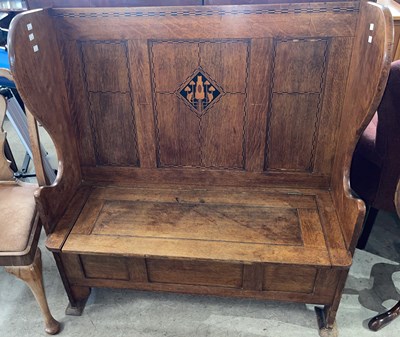 Lot 955 - An oak Arts & Crafts inlaid settle, probably...