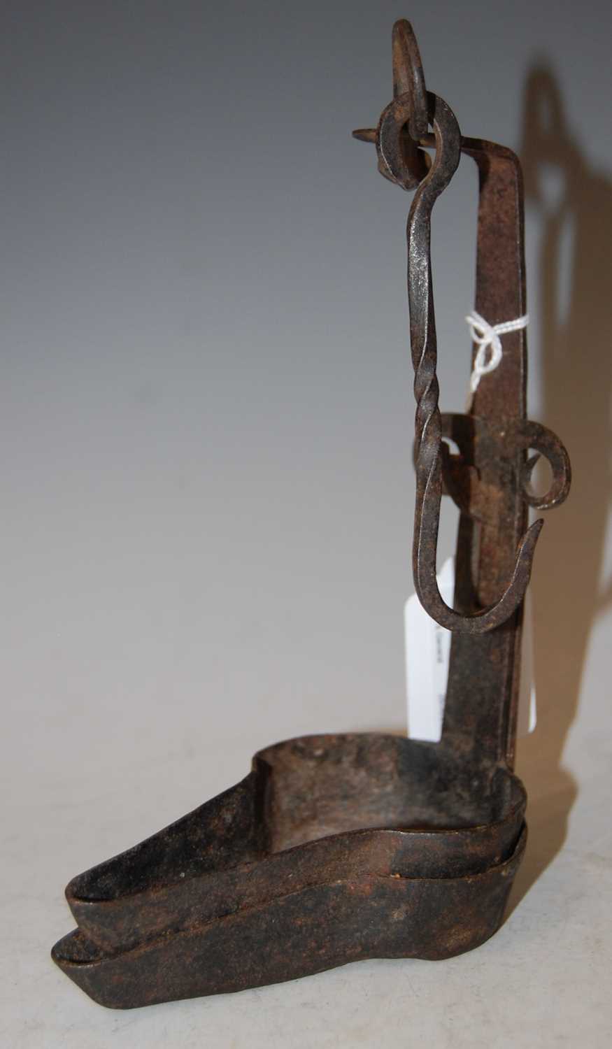 Lot 85 - An antique Scottish cruise lamp with original...