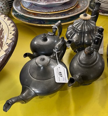 Lot 457 - Four Britannia metal small afternoon teapots...