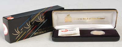 Lot 224 - A boxed New Zealand 1990 $150 gold coin,...
