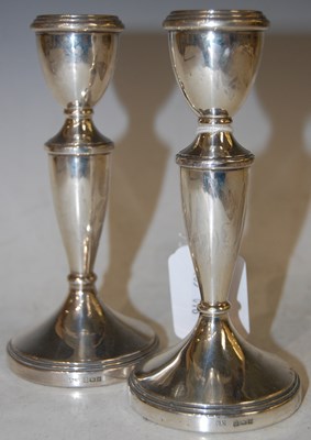 Lot 198 - A pair of Birmingham silver candlesticks,...