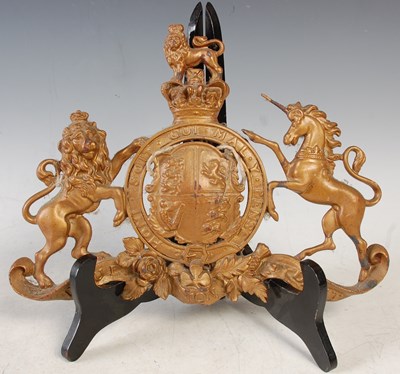 Lot 367 - A gilt painted metal Royal Warrant, late 19th/...