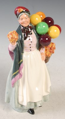 Lot 422 - A Royal Doulton figure, 'Biddy Penny Farthing'...