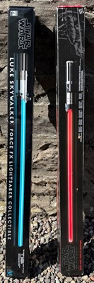 Lot 596I - Two Force FX Lightsabers comprising Darth...