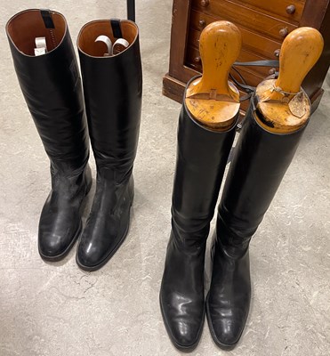 Lot 635 - A pair of vintage black leather riding boots...
