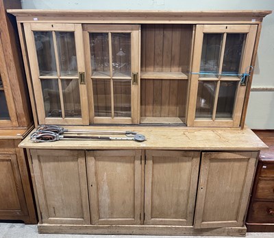 Lot 721 - A late 19th/ early 20th century pine two part...