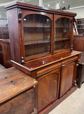 Lot 583 - A Victorian mahogany two part bookcase, the...
